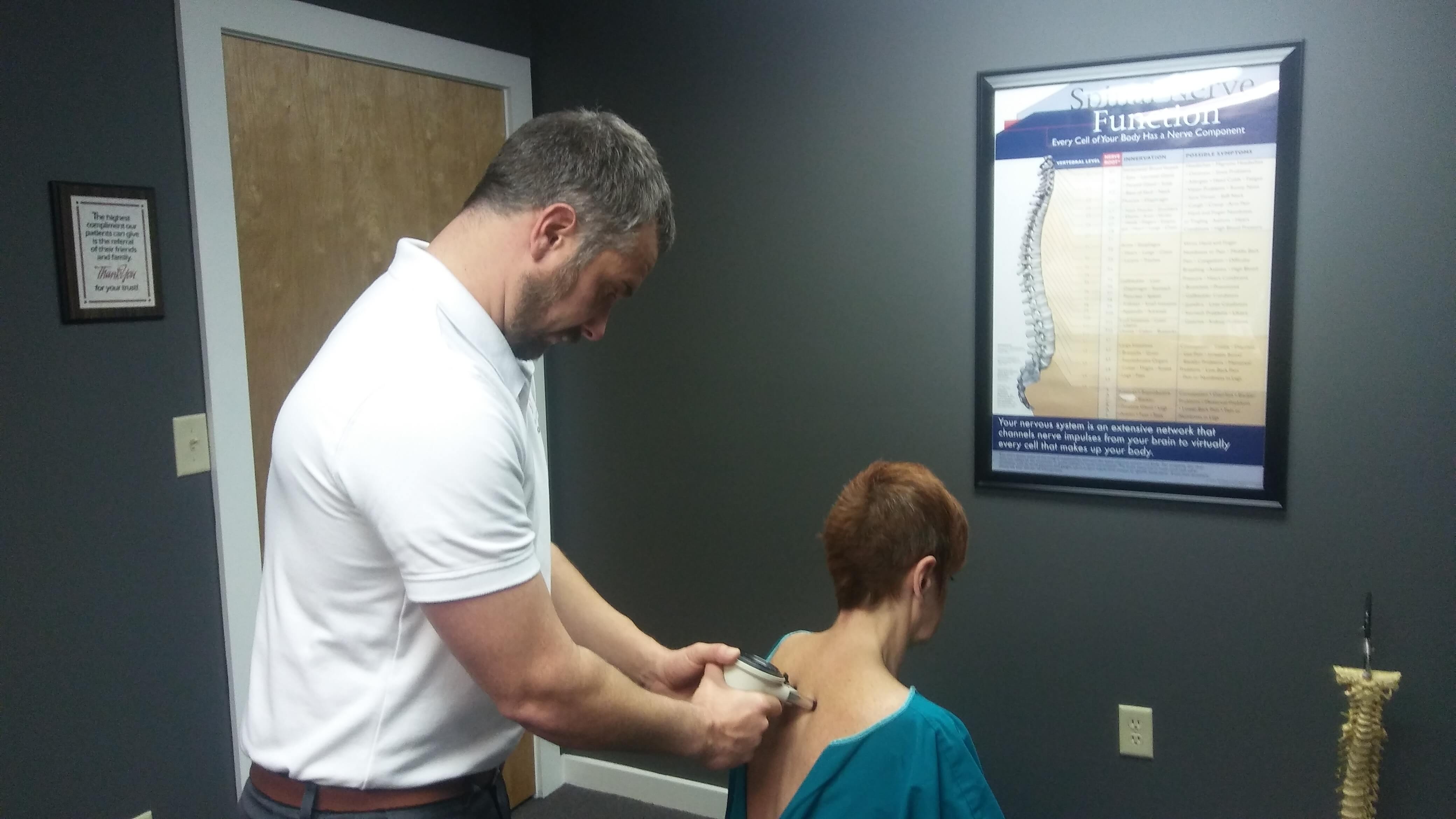 Charlottesville chiropractor performing motion palpation